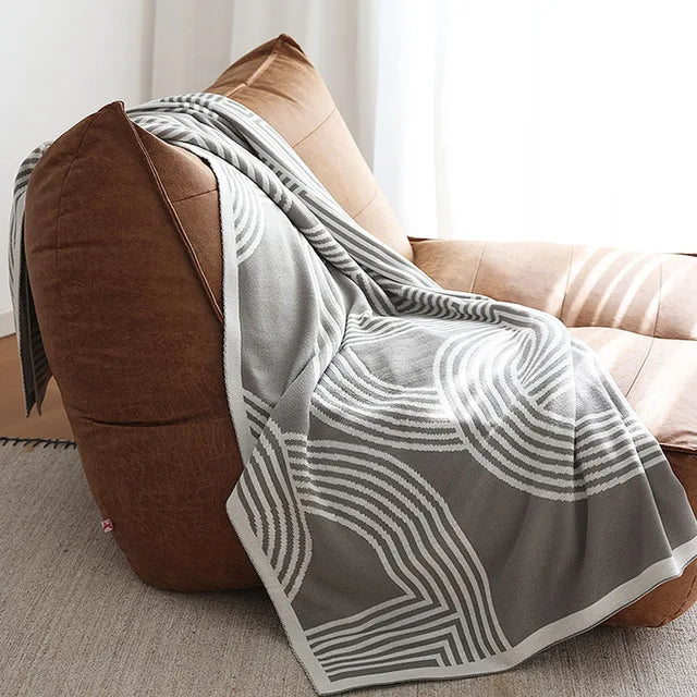 CozyGeometry - Nordische Strickdecke